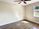 Bright bedroom with tile flooring and ceiling fan at 511 W Gardenia Dr, Orange City, FL 32763