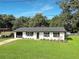 Charming ranch home with fresh paint and landscaping at 511 W Gardenia Dr, Orange City, FL 32763