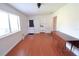 Dining room with hardwood floors and built-in shelving at 3041 Peel Ave, Orlando, FL 32806