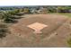 Community baseball field with picnic tables and surrounding open space at 950 Amy Ridge Ct, Kissimmee, FL 34747