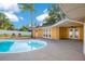 Large pool with patio and house view at 2506 Emerald Tree Ln, Apopka, FL 32712