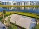 Beach volleyball court near a lake at 3161 Paradox Cir # 101, Kissimmee, FL 34746
