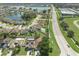 Aerial view of house and surrounding neighborhood at 1909 Cayman Cove Cir, St Cloud, FL 34772