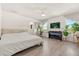 Spacious main bedroom with large bed and piano at 1909 Cayman Cove Cir, St Cloud, FL 34772