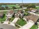 Three houses with solar panels, one with a pool, in a cul-de-sac at 1909 Cayman Cove Cir, St Cloud, FL 34772