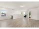 Open loft with wood flooring, offering natural light and views at 1909 Cayman Cove Cir, St Cloud, FL 34772