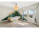 bedroom with green and white walls at 1909 Cayman Cove Cir, St Cloud, FL 34772