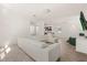 Spacious living room with large sectional sofa and kitchen view at 1909 Cayman Cove Cir, St Cloud, FL 34772