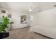 Bright bedroom with wood-look floors and large bed at 1909 Cayman Cove Cir, St Cloud, FL 34772
