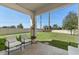 Covered patio overlooking a spacious backyard at 1909 Cayman Cove Cir, St Cloud, FL 34772