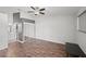Bright bedroom with mirrored closet and wood-look floors at 8850 Grand Palms Circle # B, Kissimmee, FL 34747