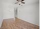 Open living room with hardwood floors and ceiling fan at 8850 Grand Palms Circle # B, Kissimmee, FL 34747