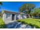Updated bungalow with a large front yard and driveway at 1300 Mercy Dr, Orlando, FL 32808