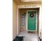 Inviting front door with wreath and seasonal decor at 2618 Coventry Ln, Ocoee, FL 34761