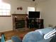 Living room with brick fireplace and built-in shelving at 2618 Coventry Ln, Ocoee, FL 34761