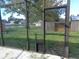 Screened patio with access to backyard and water view at 2618 Coventry Ln, Ocoee, FL 34761