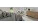 Bright bedroom with a plush bed, accent chair, and stylish dresser at 500 N 13Th St, Leesburg, FL 34748
