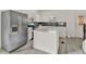 Modern kitchen with island and stainless steel appliances at 500 N 13Th St, Leesburg, FL 34748