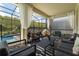 Covered patio furniture and screened pool area at 2816 Simile St, Kissimmee, FL 34746