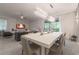 Elegant dining room with a white table and chandelier at 2816 Simile St, Kissimmee, FL 34746