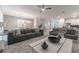 Open living space with gray sectional sofa and modern coffee table at 2816 Simile St, Kissimmee, FL 34746