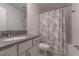 Clean bathroom with vanity, toilet and shower tub at 2816 Simile St, Kissimmee, FL 34746