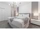 Spacious bedroom with a king-size bed and an accent wall at 2816 Simile St, Kissimmee, FL 34746