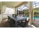 Outdoor patio with large dining table and pool view at 2816 Simile St, Kissimmee, FL 34746