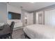 Bedroom with a queen-size bed and built-in workspace at 2816 Simile St, Kissimmee, FL 34746