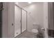 Clean bathroom with toilet and shower at 2816 Simile St, Kissimmee, FL 34746