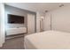 Spacious bedroom with TV and built-in entertainment center at 2816 Simile St, Kissimmee, FL 34746