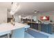 Bright dining room with modern chandelier and open concept at 2816 Simile St, Kissimmee, FL 34746