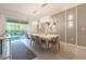 Modern dining room with a large table and statement lighting at 2816 Simile St, Kissimmee, FL 34746