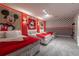 Mickey Mouse themed bedroom with three twin beds and red accents at 2816 Simile St, Kissimmee, FL 34746