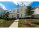 Modern two-story home with stone accents and landscaping at 2816 Simile St, Kissimmee, FL 34746