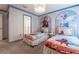 Frozen themed bedroom with two twin beds and murals at 2816 Simile St, Kissimmee, FL 34746