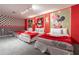 Mickey Mouse themed bedroom with three twin beds and bold decor at 2816 Simile St, Kissimmee, FL 34746
