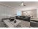 Open concept living room with a view into the dining area at 2816 Simile St, Kissimmee, FL 34746