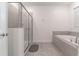 Relaxing bathroom featuring a soaking tub and a separate shower at 2816 Simile St, Kissimmee, FL 34746