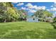 Large backyard with a detached structure at 5080 Seminole Ave, Winter Park, FL 32792