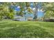 Spacious backyard with a view of the house at 5080 Seminole Ave, Winter Park, FL 32792
