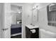Clean bathroom with a toilet, sink, and shower at 5080 Seminole Ave, Winter Park, FL 32792