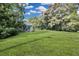 Spacious backyard with lush green grass at 5080 Seminole Ave, Winter Park, FL 32792