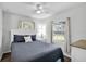Bedroom with double bed and ceiling fan at 5080 Seminole Ave, Winter Park, FL 32792