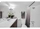 Bathroom with tub, shower, and dark wood vanity at 5080 Seminole Ave, Winter Park, FL 32792