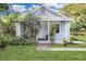 Charming light blue bungalow with a covered porch at 5080 Seminole Ave, Winter Park, FL 32792