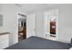 Bedroom with double bed and views into other rooms at 5080 Seminole Ave, Winter Park, FL 32792