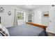 Cozy bedroom with a double bed and access to a bathroom at 5080 Seminole Ave, Winter Park, FL 32792