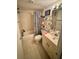 Clean bathroom with tub, shower, and updated vanity at 6110 Peregrine Ave # E05, Orlando, FL 32819