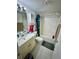 Clean bathroom with tub, toilet, and vanity at 6110 Peregrine Ave # E05, Orlando, FL 32819